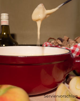 Schweizer Chalet Käsefonduemischung mit Äpfelwein und Calvados Serviervorschlag